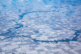 Aerial view of Humbolt, Iowa isolated buy the frozen tundra and cropland in the winter.