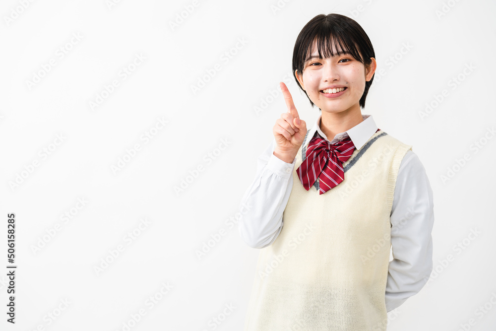 指差しをする女子高校生 指差しをする女子高校生
