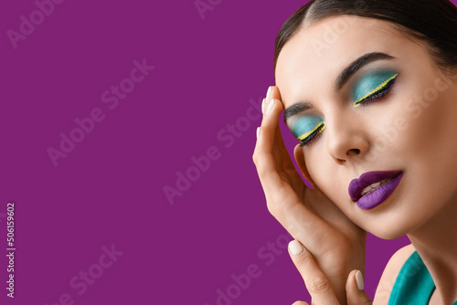 Beautiful young woman with ...