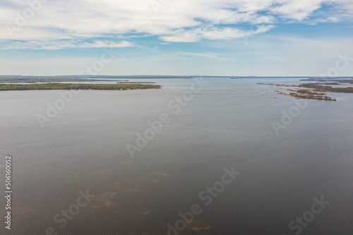 Georigian bay drone photos with beaches and islands by waubaushene beach going into lake huron with clouds and blue skies 