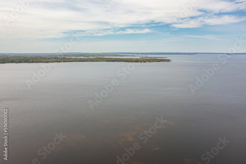 Georigian bay  drone photos with beaches and islands  by waubaushene beach going into lake huron with clouds and blue skies  photo