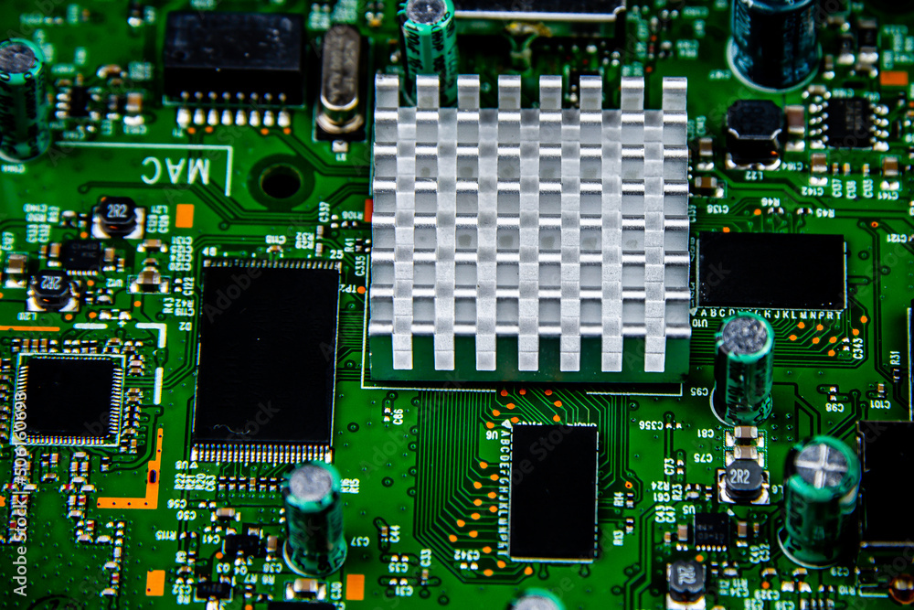 Green microchip, computer detail, close-up. Green microchip, computer detail, close-up.