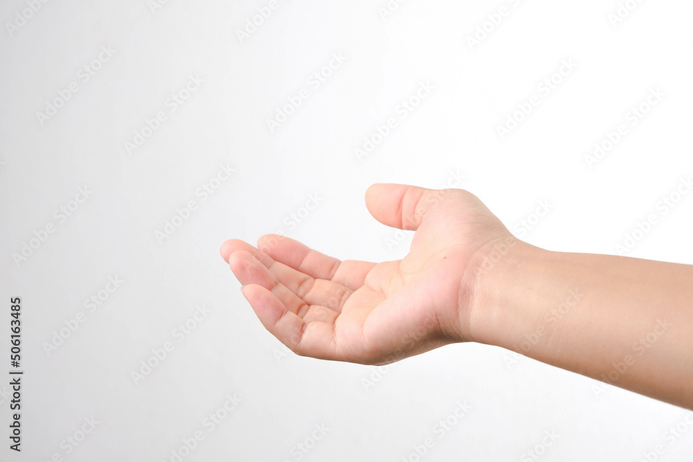 Close up of female hand reaching out and ready to help or receive. Hand open gesture isolated on white background