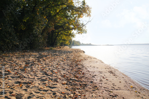 Bank of river with sand and...