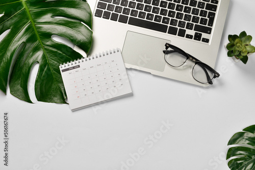 Modern laptop, calendar, ey...