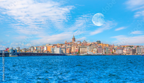 Fototapeta Naklejka Na Ścianę i Meble -  Galata Tower, Galata Bridge, Karakoy district and Golden Horn with full moon - istanbul, Turkey 
