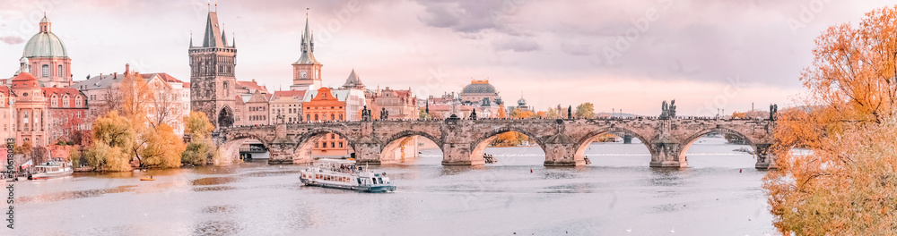 Panoramic view of Charles Bridge in Prague, beautiful landscape. The photo was processed in pastel colors. - obrazy, fototapety, plakaty 