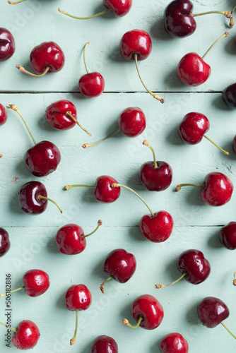 Delicious red cherries placed on the table as a pattern