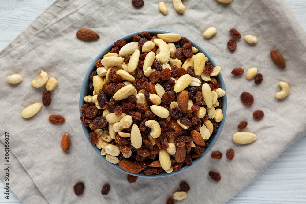 Raw Trail Mix with Nuts and Fruits in a Bowl, top view. Flat lay, overhead, from above. Raw Trail Mix with Nuts and Fruits in a Bowl, top view. Flat lay, overhead, from above.