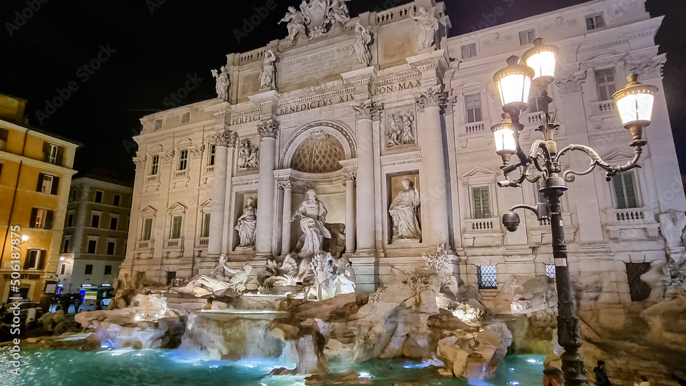 Illuminated Trevi Fountain at night. Largest Baroque fountain in the city. Famous fountain in the world located in Rome (Roma), Lazio, Italy, EU Europe. Fontana di Trevi in the Trevi district