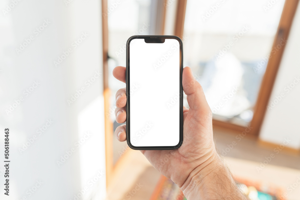 Smartphone mockup, internet of things and smart home concept, man using mobile phone Smartphone mockup, internet of things and smart home concept, man using mobile phone