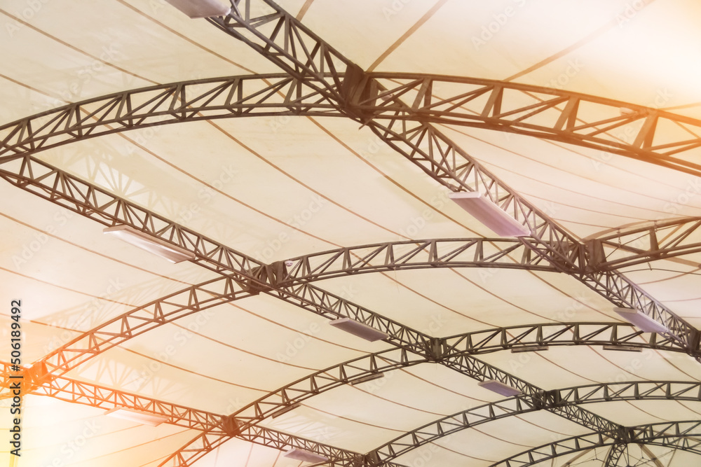 Arched metal frame tent with white coated fabric material, with interior lighting lamps. Arched metal frame tent with white coated fabric material, with interior lighting lamps.