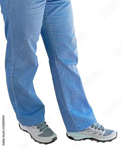 legs in blue jeans and sneakers