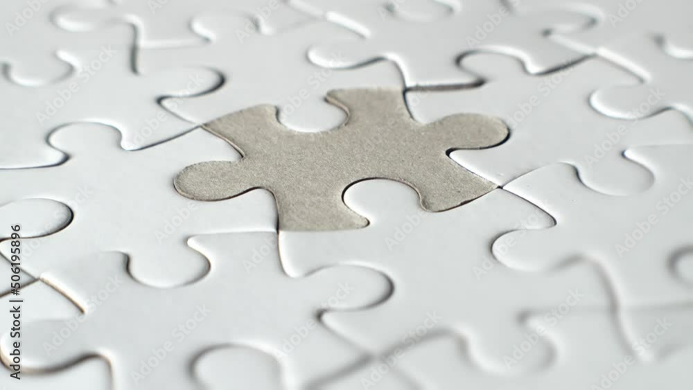 Hand putting up the last piece of a puzzle upside down. Jigsaw Puzzle reversed piece coming down to completion. Business concept for key completion for business success.
Hand putting up the last piece of a puzzle upside down. Jigsaw Puzzle reversed piece coming down to completion. Business concept for key completion for business success.
