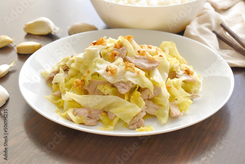 Cabbage and Pork Stir Fry on a white plate.