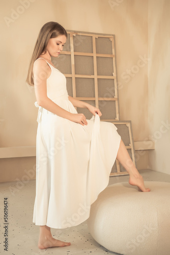 young girl lifted her dress and bared her leg