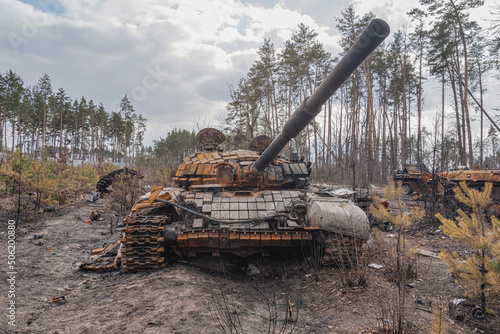 The destroyed tank stands at the scene of hostilities. War in Ukraine  war concept 