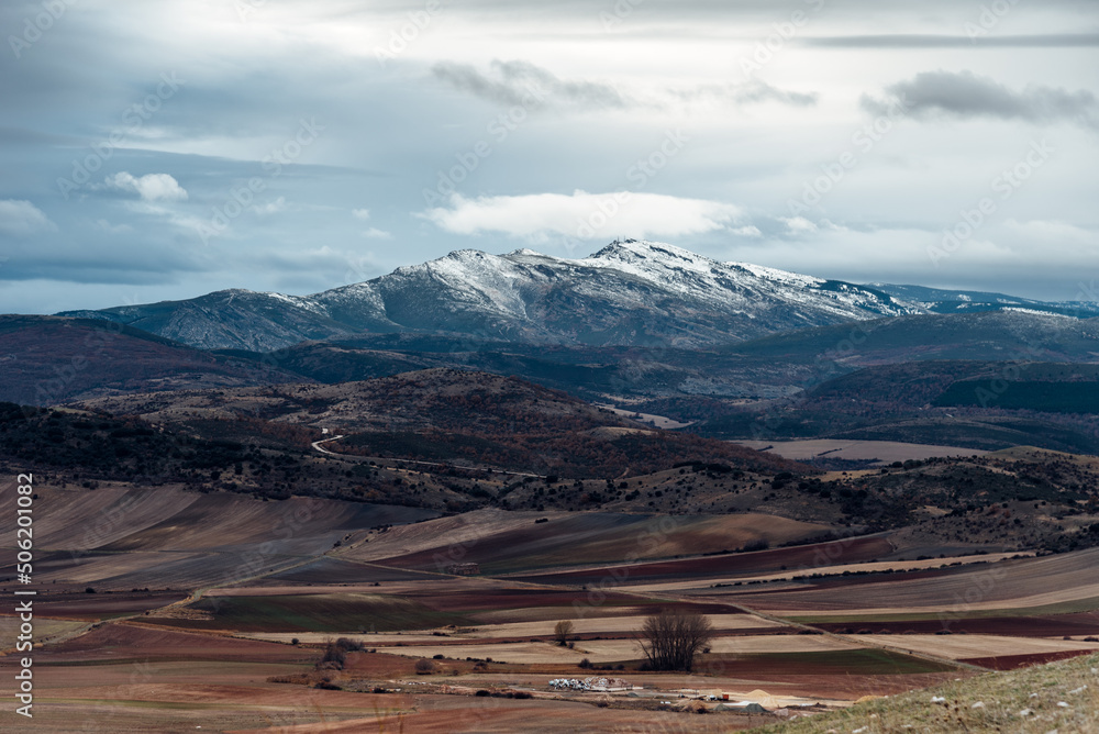 View of the peak Ocejon belonging to the mountain range of Ayllon in Guadalajara. Snowcapped peaks during wintertime