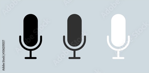 Microphone icon set. Podcast vector icon set in black  grey and white colors.