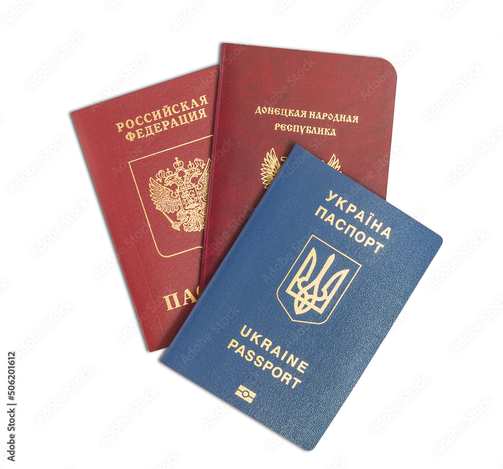 Passport of a citizen of the Russian Federation of the Donetsk People's Republic and Ukraine on a white background. Passport of a citizen of the Russian Federation of the Donetsk People's Republic and Ukraine on a white background.