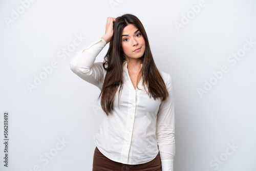 Young Brazilian woman isolated on white background with an expression of frustration and not understanding photo