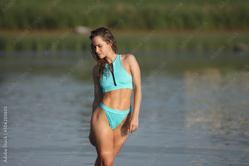 Beautiful woman in bikini on the beach