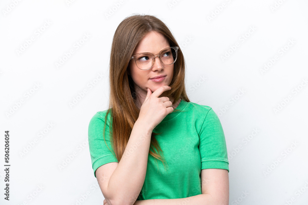 Young caucasian woman isolated on white background With glasses and having doubts Young caucasian woman isolated on white background With glasses and having doubts