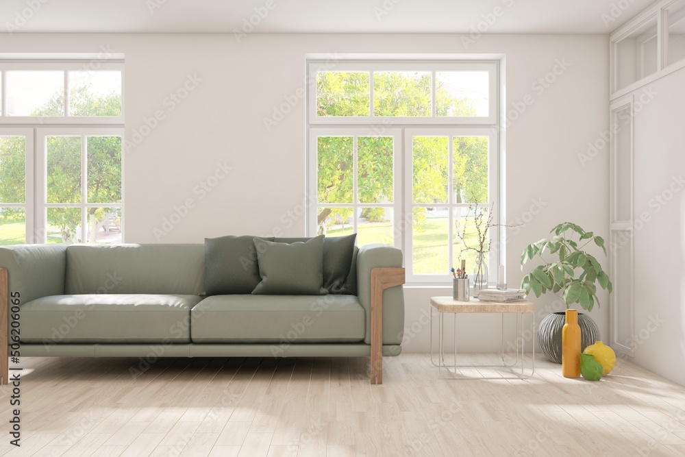 Fototapeta premium White living room with sofa and summer landscape in window. Scandinavian interior design. 3D illustration