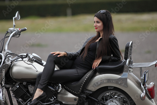 woma in black with a motorcycle © zhagunov_a