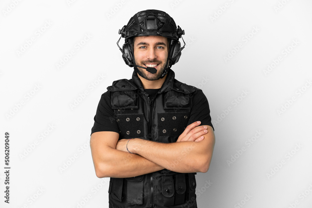 Young caucasian swat isolated on white background keeping the arms crossed in frontal position Young caucasian swat isolated on white background keeping the arms crossed in frontal position