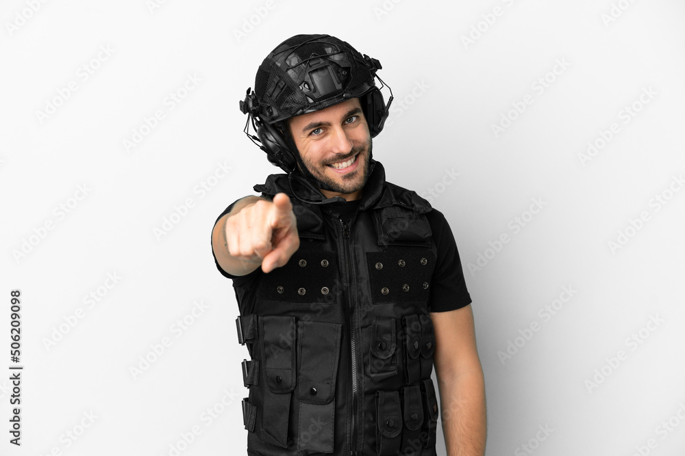 Young caucasian swat isolated on white background points finger at you with a confident expression Young caucasian swat isolated on white background points finger at you with a confident expression