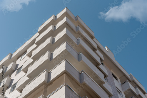 Corner of a modern European residential apartment building. photo