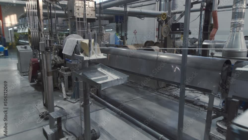 Sophisticated equipment of a modern workshop for the production of optical fiber. Continuous operation of machine lines. Sophisticated equipment of a modern workshop for the production of optical fiber. Continuous operation of machine lines.