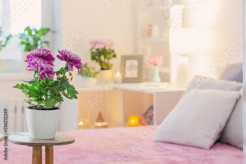 interior of bedroom with chrysanthemum flowers