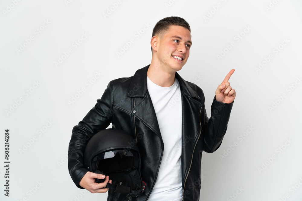 Caucasian man with a motorcycle helmet isolated on white background pointing up a great idea Caucasian man with a motorcycle helmet isolated on white background pointing up a great idea