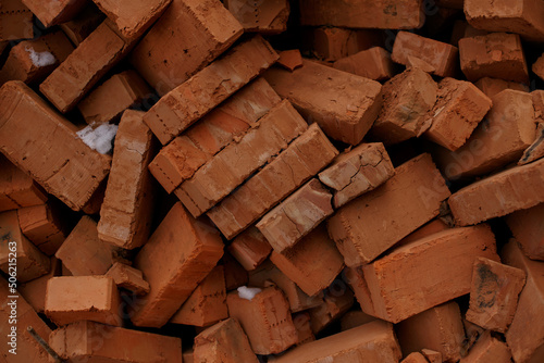 pile of brick block used for industrial in residential building construction site, image for industry background. Solid clay bricks for construction. Brick. Close-up.