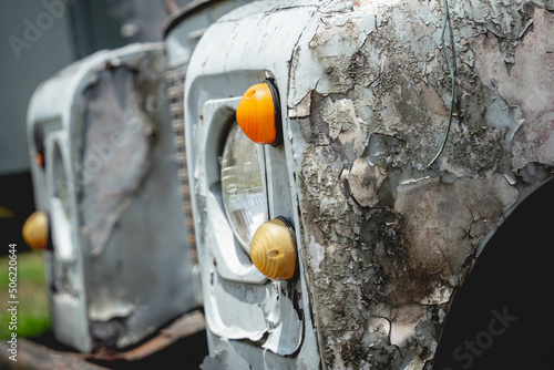 Old rusty cars for safari in the jungle of Africa