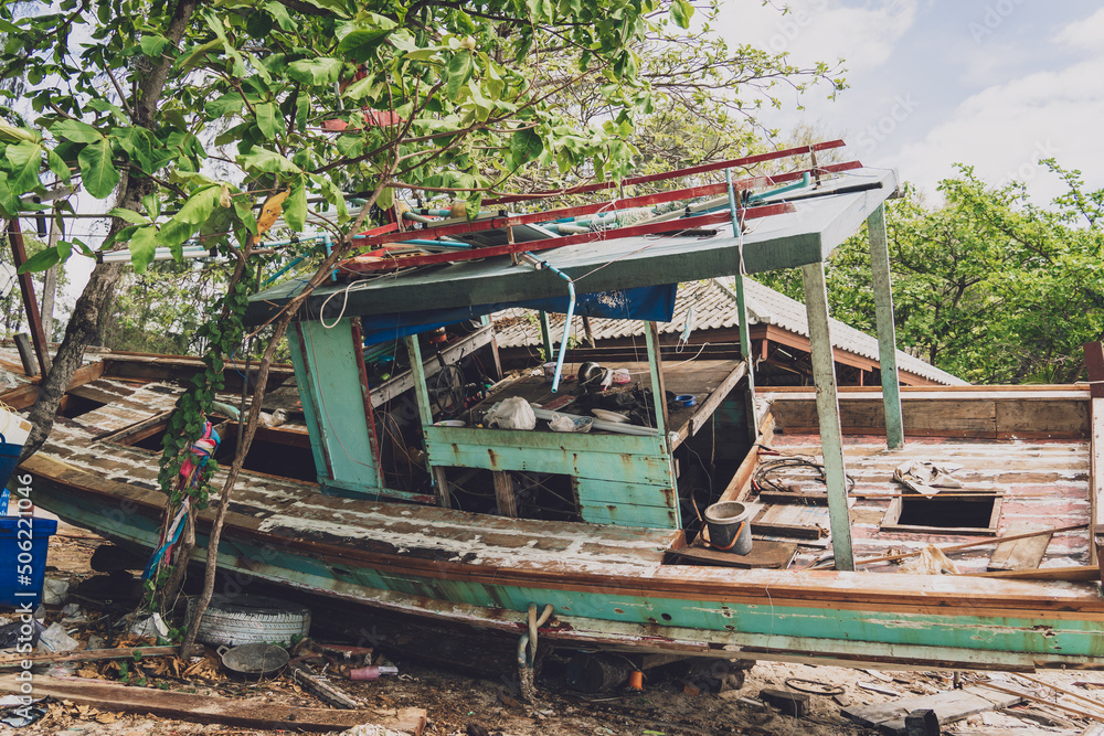 Old thai wooden boat on the beach Old thai wooden boat on the beach