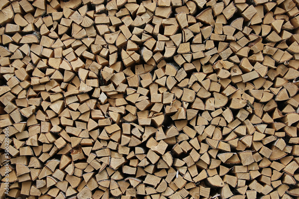 Wooden background or texture for your interior design. Chopped birch firewood Wooden background or texture for your interior design. Chopped birch firewood
