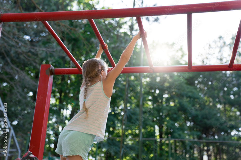 Fototapeta premium Kids sport. Summer outdoors activity. Competitions and female victory.