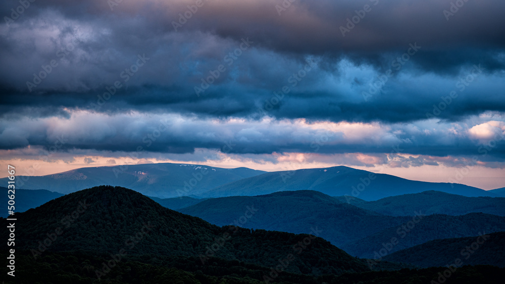 Dramatic cloudy sky over the mountains. Polonina Rivna, The Carpathians, Ukraine.