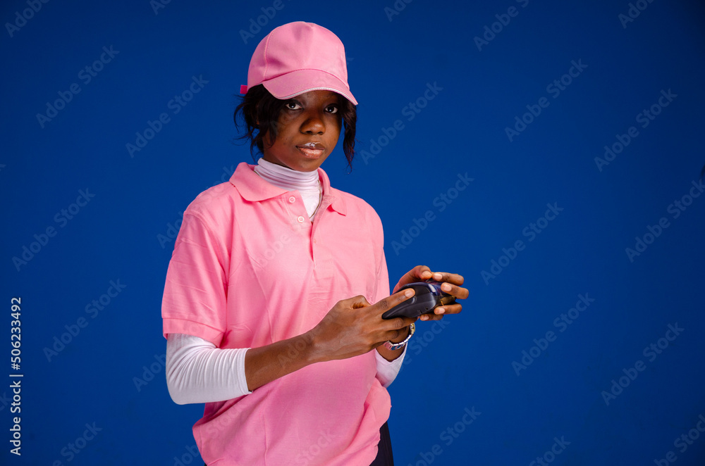 african woman using a point of sale device african woman using a point of sale device