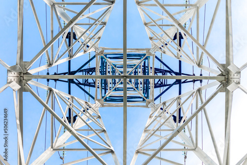 High voltage power lines. Structure of electrical tower. Seen from below