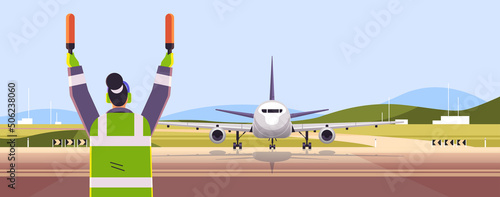aviation marshaller navigate with light sticks air traffic controller airline worker in signal vest professional airport staff