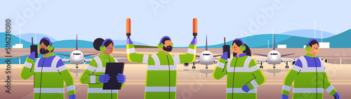 aviation marshallers supervisors team in uniform air traffic controllers airline worker in signal vests professional airport staff