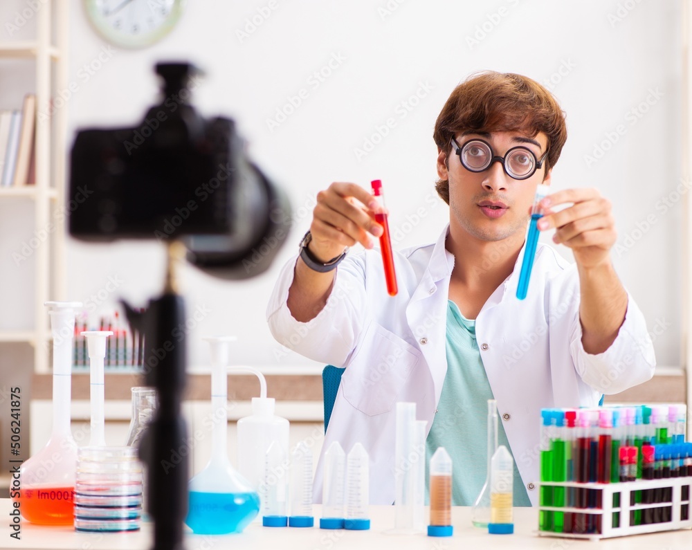 Chemist blogger recording video for his blog Chemist blogger recording video for his blog