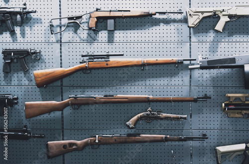Collection of rifles and carbines on the wall