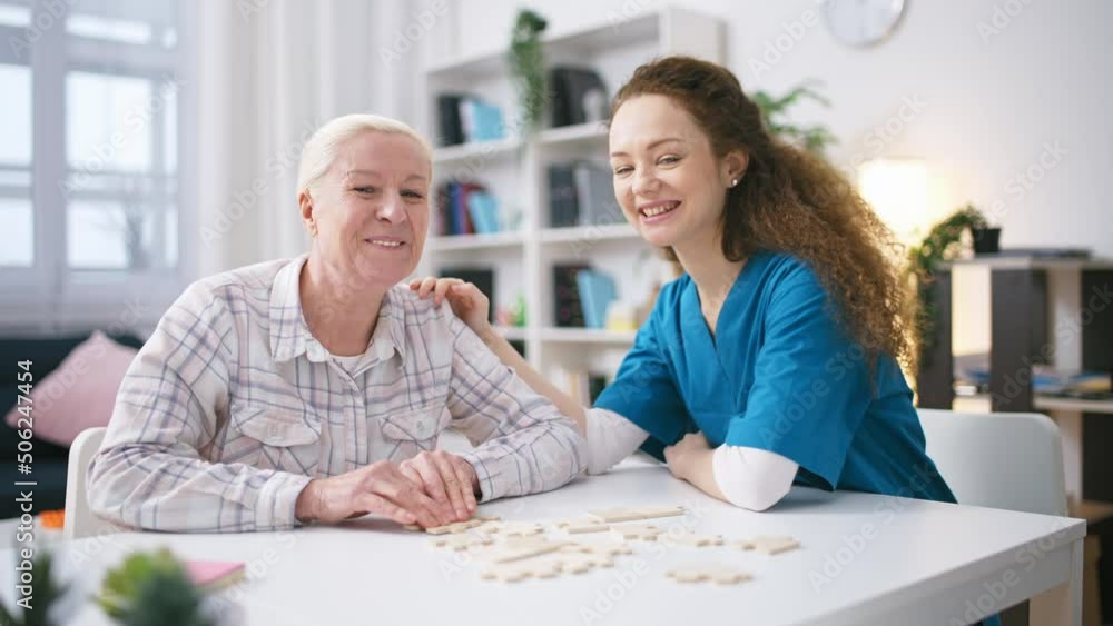 Portrait of nurse and senior woman in a retirement home, elderly home care Portrait of nurse and senior woman in a retirement home, elderly home care