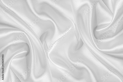 Obraz na płótnie Closeup of rippled white silk fabric. White silk fabric as an abstract background. w salonie