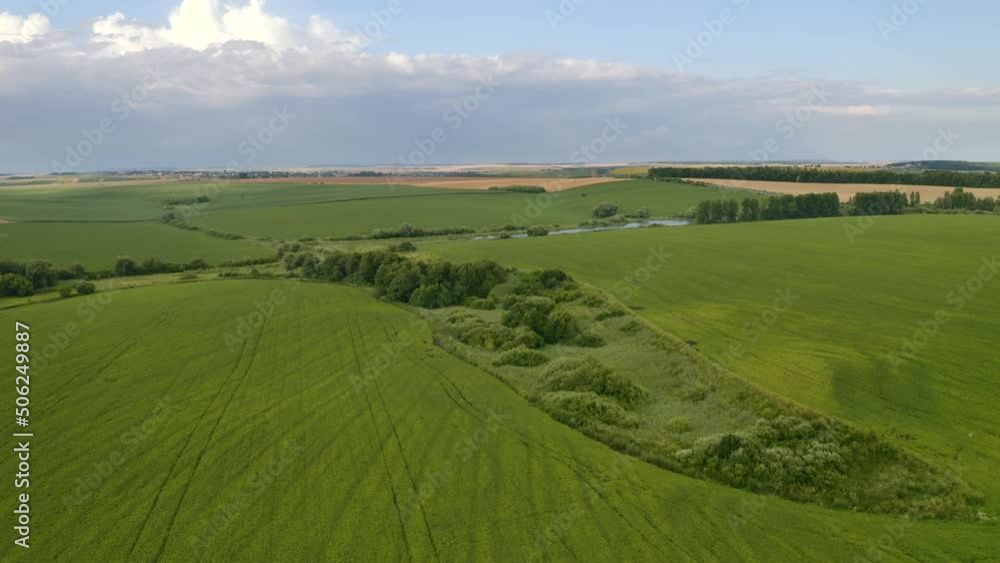 Spectacular view of a green undulating field. Filmed in UHD 4k video. Spectacular view of a green undulating field. Filmed in UHD 4k video.